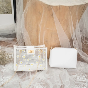 Transparent daisy crossbody bag with gold chain and white inner pouch for women