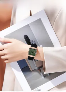 Detail showing the green square dial and rose gold case of this elegant quartz watch