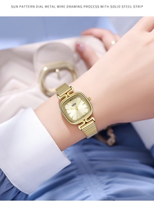 Detail of GEDI vintage square watch with sunray dial and solid gold steel strap