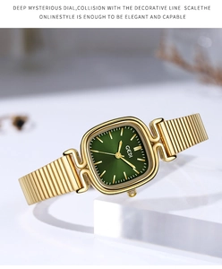 Macro detail of GEDI vintage square watch with emerald green dial and gold chain strap