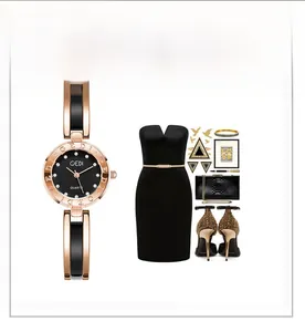 Detailed view of GEDI women's rose gold watch with black dial and crystal markers
