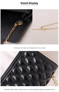 Detail of black quilted jelly bag featuring a glossy finish and adjustable gold chain strap