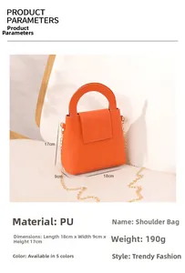 Vue détaillée du mini sac Boston orange en cuir PU avec bandoulière en chaîne dorée