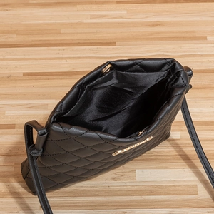 Chic black quilted crossbody bag with gold hardware and rhombic pattern displayed from above