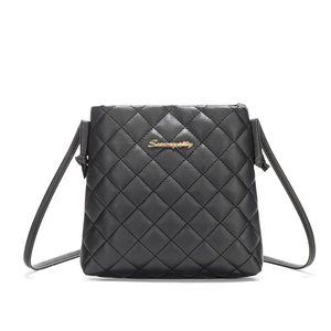 Minimalist black quilted shoulder bag for women with gold logo and crossbody strap