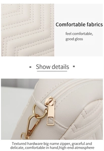 Detail view of cream quilted faux leather with luxury gold-tone metal zipper hardware