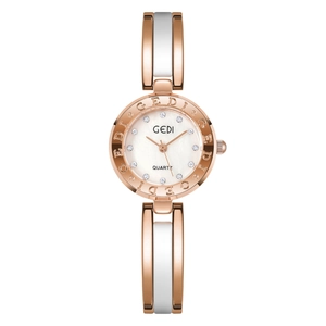 Elegant rose gold and white ceramic quartz watch for women with sparkling crystal indices