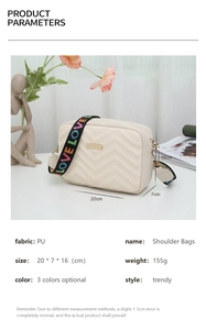 Detail view of beige quilted PU crossbody bag with size specs and LOVE woven strap