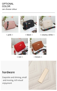 Detailed close-up of colorful embroidered LOVE strap and golden hardware on camera bag
