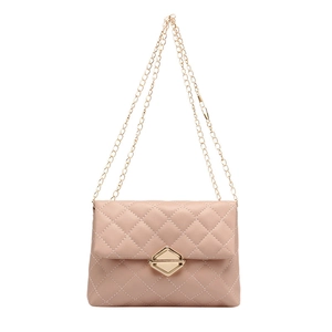 Elegant nude pink quilted crossbody bag with gold chain strap and metal clasp closure