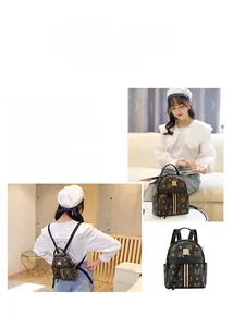 Close-up of vintage brown mini backpack with classic monogram pattern and striped detail