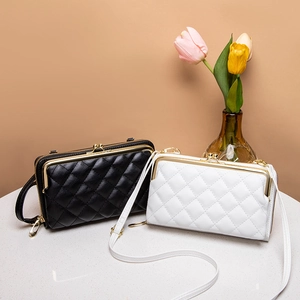 Elegant quilted cross-body bag and long wallet with retro metal clasp in black and white