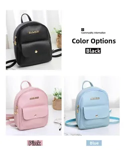 Close-up of mini backpacks in black, pink, and blue with lychee leather texture