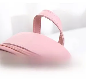 Detail of comfortable pink leather handle with premium stitching for women backpack