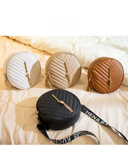 Quilted round crossbody bags in four colors with gold tassel and chevron patterns