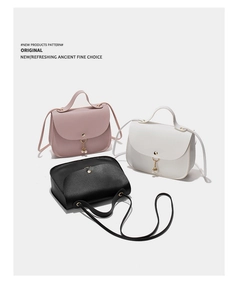 Detailed view of fashion mini square handbags with pearl gold charms in three colors