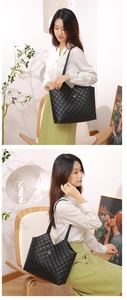 Quilted black tote bag with gold flower emblem shown on model in cozy home setting