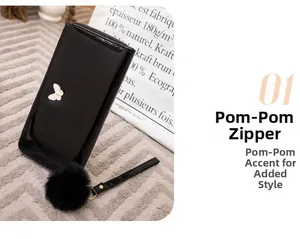 Glossy black oil leather lady wallet with metal butterfly detail and large fur pompom
