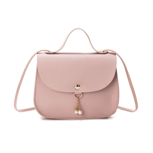 Pink PU leather crossbody bag for women featuring a pearl pendant and top handle