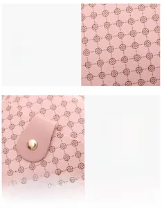 Detailed shot of pink leather texture with clover print and gold metal buckle