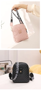 Detail view of small crossbody bags with geometric logo pattern and wide ribbon straps