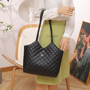 Large capacity black quilted tote bag with golden clover logo for stylish women travel