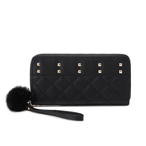 Women's black quilted long wallet with gold studs and a matching pom-pom charm