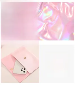 Pink pearlescent textured mini pouch with gold magnetic closure and interior phone space