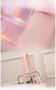 Detail of pink leather handbag showing stitching quality and holographic texture