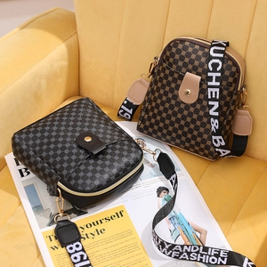 Classic vintage monogram crossbody bags in black and brown with wide shoulder straps