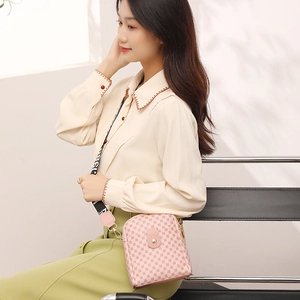 Pink printed crossbody bag for women featuring a stylish logo wide shoulder strap