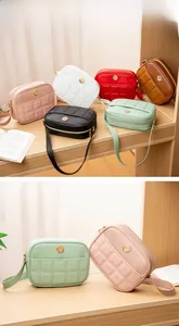 Detailed display of large capacity quilted PU leather handbags in multiple stylish colors