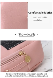 Detail of pink lychee leather texture and golden metal zipper on the sequin backpack