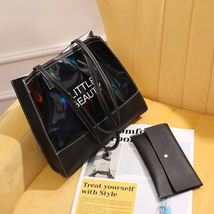 Black holographic tote bag with Little Beauty text and matching envelope clutch set