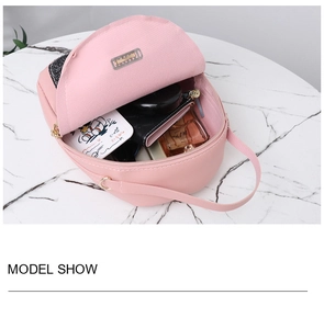 Interior view of pink sequin dome backpack showing spacious storage for daily essentials