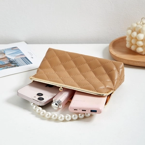 Brown quilted crossbody bag with pearl handle and gold clasp closure for women