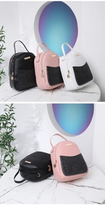 Close-up of mini sequin backpack showing premium leather texture and gold metal accents