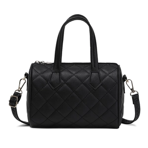 Classic black quilted Boston bag with top handles and a detachable shoulder strap