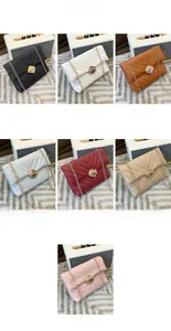 Multiple colors of quilted chain bags with metal locks including black white and red