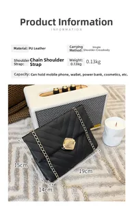 Detail showing dimensions 19x15x14cm of black quilted PU leather bag with gold chain strap