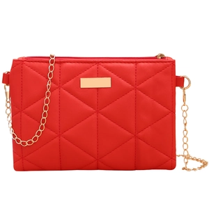 Red quilted crossbody lady bag with golden chain strap and rhombus stitching patterns