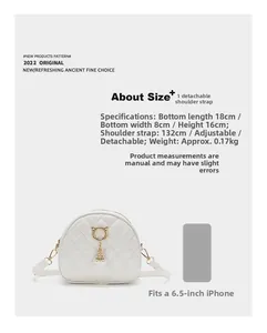 Size chart showing dimensions for white quilted bag with cat pendant and pearl detail