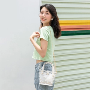 Sac seau transparent en PVC avec imprimé marguerite et bandoulière en chaîne mode