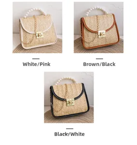 Detailed comparison of straw bags with pearl handles in white, brown, and black trim