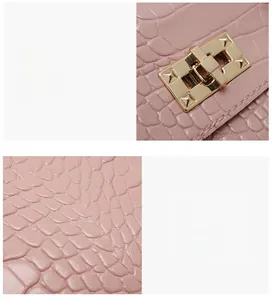 Détails de texture cuir rose embossé crocodile et fermoir doré rotatif en métal