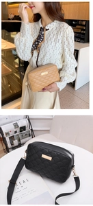 Close-up of wavy quilted crossbody bags in black and earth tones with gold hardware
