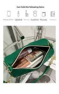 Detail of green cylinder bag showing spacious interior capacity with gold zipper detail