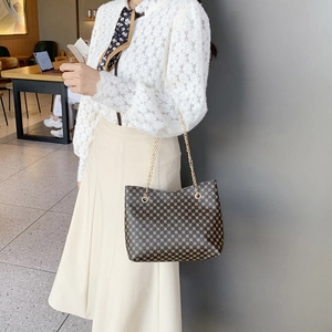 Retro large capacity dark brown printed tote bag with golden chain and circular pattern