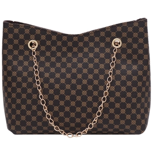 Deep brown bucket bag with clover prints and gold chain straps on white background