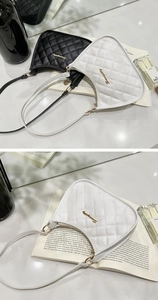 Detailed comparison of black and white quilted hobo bags with golden hardware logo